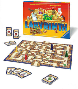 The Labyrinth board game by Ravensburger displayed with its colorful box featuring a maze and playful illustrations. The game board is laid out showing a winding path, various character pieces in yellow, red, green, and blue, along with a set of game cards depicting treasures and magical creatures. An engaging family game designed for strategic treasure treasures in a moving maze.