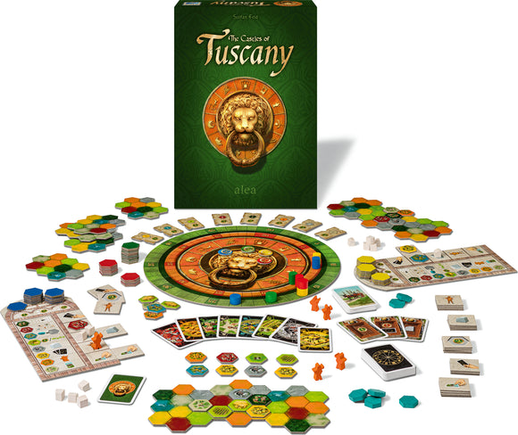 The Castles of Tuscany game by Ravensburger, featuring a vibrant green box with a golden lion emblem. The game setup includes a circular board at the center, surrounded by various colorful hexagonal tiles, player tokens in orange and blue, and multiple game cards. The intricate design showcases medieval elements, making it visually appealing and engaging for players of all ages.