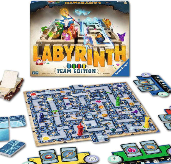 The Labyrinth Team Edition game by Ravensburger. The box is displayed at the back, with the game board featuring a maze filled with colorful paths and various pieces including game tokens in green, red, yellow, and purple. Additional cards and tiles are positioned around the board, showcasing the interactive gameplay elements. Ideal for team play and strategic fun for ages 8 and up.