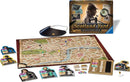 Scotland Yard: Sherlock Holmes Edition game by Ravensburger displayed with components including a large map of London, character cards, colored tokens, a magnifying glass, and the game box featuring artwork of Sherlock Holmes. The game elements invite players into a detective mystery experience.
