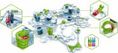 The GraviTrax Speed Set by Ravensburger is a DIY kit featuring a modern marble run system. The image showcases various track elements in vibrant green and white, including curved tracks, loops, and ramps. Multiple hexagonal pieces are connected, illustrating the potential for creative construction. The kit promotes STEM learning through fun engineering challenges.