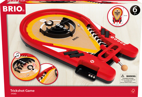 The Trickshot Game by Brio features a colorful design with a red and yellow playing surface. It includes a launching mechanism and scoring zones marked with points, perfect for fun and competitive play. Designed for children aged 6 and up, this game encourages accuracy and skill as players try to score points by launching a small ball into various scoring areas.