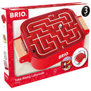 The Take Along Labyrinth by BRIO is a portable mechanical puzzle featuring a red rectangular base with a white labyrinth design. It includes a small silver ball that navigates through the pathways of the maze, promoting fine motor skills and problem-solving. Designed for children aged 3 and up, the puzzle is easy to transport with its convenient handle and provides hours of engaging entertainment.
