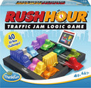 Rush Hour Traffic Jam Logic Game by ThinkFun features a colorful grid with various plastic car and truck pieces in multiple colors. The game aims to solve traffic jam challenges, encouraging critical thinking and problem-solving skills. The packaging showcases appealing graphics and highlights '40 All New Challenges.' Suitable for ages 8 and up, the game can be played solo or with friends.