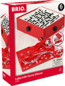 The Labyrinth Game Deluxe by Brio features a vibrant red box with an interactive maze layout inside. The game includes a metal ball that players guide through various paths and obstacles, promoting fine motor skills and critical thinking. Suitable for ages 6 and up, it is designed to provide endless fun and challenge for families and friends.