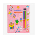 A colorful DIY kit called Sweat Treats Shrinkies by Tiger Tribe. The kit includes vibrant colored pencils and plastic sheets with pre-printed designs like cute food characters, ice cream, and playful accessories. Ideal for creative crafting, allowing kids to design and shrink their own unique keychains and charms.