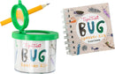 The Bug Spotter Kit by Tiger Tribe includes a clear magnifying container with a green lid, a yellow pencil, and a colorful spiral-bound handbook filled with drawings of various bugs. This educational kit is perfect for young explorers interested in nature and bug identification.