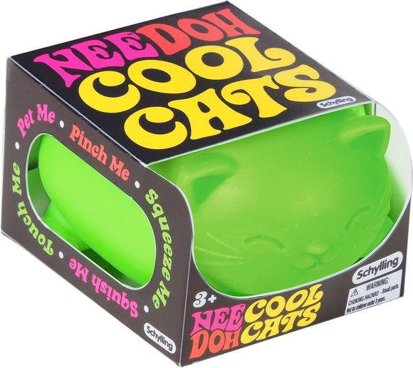 NeeDoh Cool Cats by Schylling is a vibrant green fidget toy shaped like a cute cat. The packaging features colorful text encouraging users to interact with the toy by squeezing, pinching, and touching it for stress relief and sensory fun.