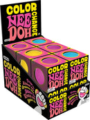 Color Change NeeDoh by Schylling Associates Inc. displayed in a colorful box. It features several stress-relief balls in vibrant colors, showcasing a unique color-changing effect. Each ball is designed for squeezing, stretching, and squishing, perfect for enhancing sensory engagement and relaxation.