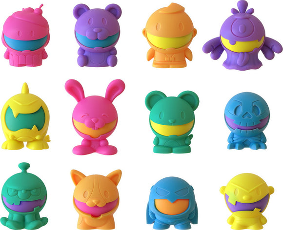A colorful assortment of Needoh Dohjee figures by Schylling, featuring playful designs including a purple bear, a pink bunny, an orange character, and more, all made of soft, squishy material. Ideal for fidgeting, stress relief, and imaginative play.