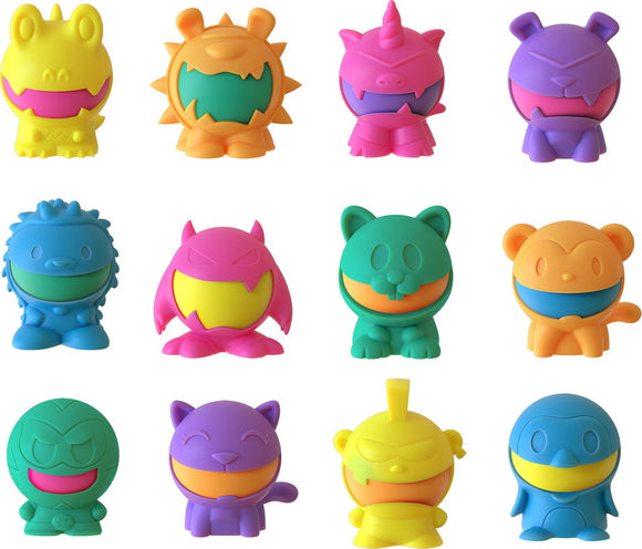 A colorful assortment of Needoh Dohjee sensory fidget toys by Schylling. Each toy features a unique character design including a dinosaur, monster, unicorn, and various animals, all with bright colors and a squishy texture perfect for stress relief and tactile play.