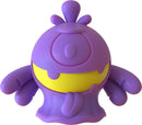 The Needoh Dohjee is a vibrant purple fidget toy shaped like a friendly creature, featuring a round body with a yellow middle section and whimsical arms. It is made of soft, squishy material that encourages tactile exploration and stress relief.