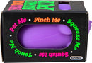 NeeDoh Funky Pup by Schylling, a vibrant purple fidget toy packaged in a colorful box. The box features playful text encouraging interaction, such as 'Pinch Me', 'Squeeze Me', and 'Pet Me'. This sensory toy is designed to provide stress relief and tactile fun.