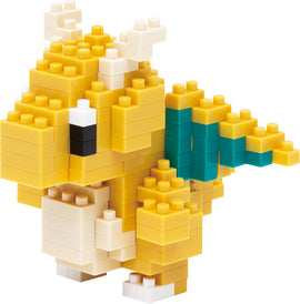 A detailed view of a Nanoblock Dragonite DIY kit, featuring a colorful assemble model resembling a dragon with a yellow body, turquoise wings, and white accents. Ideal for building enthusiasts and fans of intricate designs.