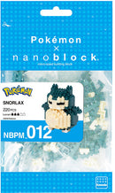 Nanoblock DIY kit featuring Snorlax from Pokémon, containing 220 micro-sized building blocks. The package showcases the assembled Snorlax figure with vibrant colors, ideal for collectors and Pokémon fans.