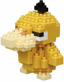Nanoblock Psyduck DIY kit featuring a cute, miniaturized Psyduck character made from interlocking plastic blocks. The figure showcases Psyduck's distinct yellow body, simple facial features, and a small black tuft on its head, encouraging creativity and fine motor skills while building.