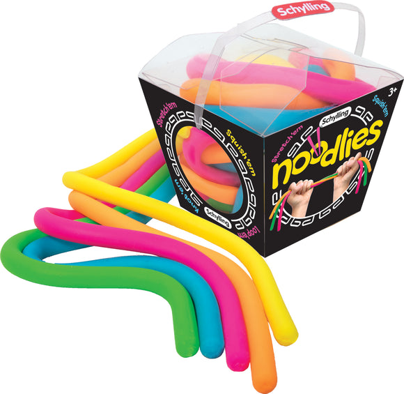 A colorful set of Needoh Noodies by Schylling, featuring stretchy, squishy noodles in vibrant colors including pink, yellow, green, and blue. The noodles are packaged in a clear box with a handle, perfect for sensory play and stress relief.