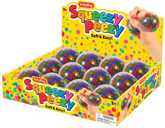 Colorful and squishy Nee Doh Squeezy Peezy balls displayed in a bright, polka-dotted box. The toy is ideal for stress relief and sensory play, encouraging tactile engagement. Each ball features vibrant beads encased in a soft, stretchy outer layer, perfect for squeezing and fidgeting.