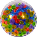 A colorful Nee Doh Squeezy Peezy stress ball by Schylling. The ball is made of a transparent material filled with vibrant colored beads in various sizes, creating a visually appealing and tactile experience. Ideal for stress relief and sensory play.