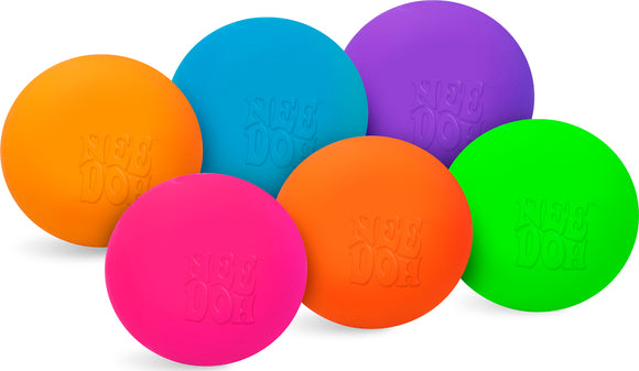 A colorful assortment of Tiny Needoh fidget toys by Schylling. The set includes six vibrant, squishy balls in orange, pink, green, blue, purple, and orange, featuring the brand name embossed on the surface. These tactile toys are perfect for stress relief and sensory play.