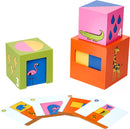 Peek-A-Zoo mechanical puzzle set featuring colorful cubes with animal designs, including a flamingo, crocodile, and giraffe, alongside illustrated cards for matching and stacking activities, promoting logical thinking and creativity in children.