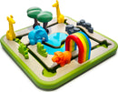 Safari Park Jr. from Smart Toys & Games is a colorful mechanical puzzle designed for young children. It features a vibrant play field with cute animal figures including a blue elephant, an orange lion, and yellow giraffes, accompanied by trees, grass, and a pond. This engaging puzzle promotes problem-solving skills and creative play through its interactive elements.