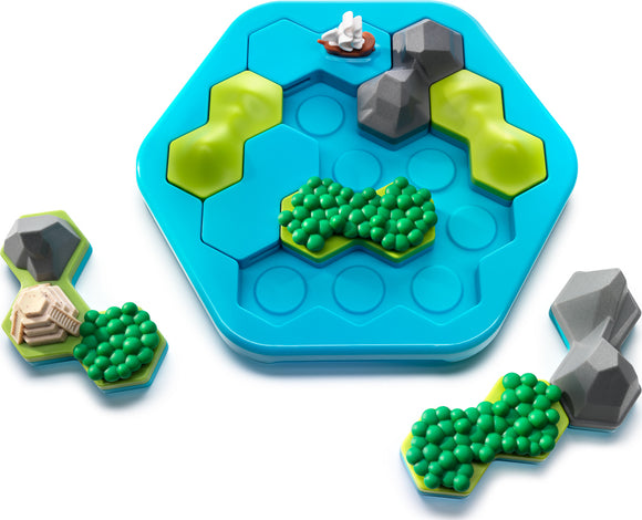 Treasure Island by Smart Toys and Games is a colorful mechanical puzzle featuring hexagonal pieces in shades of blue, green, and gray. The puzzle includes a base with indented circles and various land and water shapes resembling a treasure island landscape, complete with a small boat and rocky terrain elements. Designed to challenge problem-solving skills, it's suitable for children and adults.