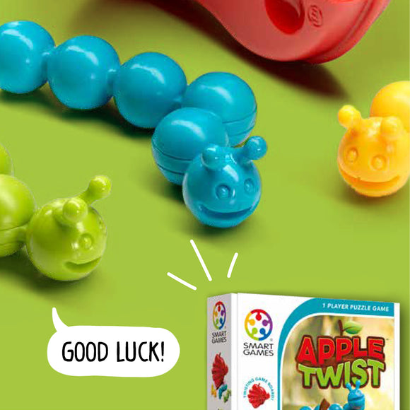 Apple Twist by Smart Toys & Games is a colorful mechanical puzzle featuring bright blue, green, and yellow caterpillar pieces. The puzzle box is displayed prominently, with a playful design and the tagline 'Good Luck!' indicating it’s a fun, brain-teasing game for one player. The background is vibrant green, enhancing the playful appeal of the product.