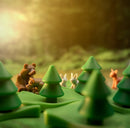 Grizzly Gears by Smart Toys & Games showcases a vibrant mechanical puzzle featuring playful animal figurines, including bears and rabbits, set in a lush green wilderness with stylized trees. This engaging design encourages imaginative play and problem-solving skills as users navigate through this charming forest scene.