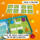 Turtle Tactics by Smart Toys & Games is a colorful mechanical puzzle. The image features a game board with colored turtles, fences, and a hare. An open instruction booklet showcasing various challenges is included, inviting players to strategize and solve puzzles. The setup illustrates the importance of positioning and problem-solving, appealing to both young and experienced puzzle enthusiasts.