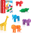 A colorful DIY kit titled 'My First Safari Animals' by Smart Toys & Games. The kit features plastic animal figures including a giraffe, lion, elephant, crocodile, and rhino in vibrant colors like yellow, red, blue, green, and purple. The packaging displays the product name and suggests it's designed for toddlers aged 1-5 years, encouraging imaginative play and creativity.