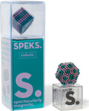 Speks Stripes Nebula by SPEKS showcases a collection of colorful magnetic beads in various sizes, designed for creative building and stress relief. The packaging features a vibrant teal background with playful graphics, highlighting the product's fun and interactive nature while the beads are displayed in an appealing geometric shape.