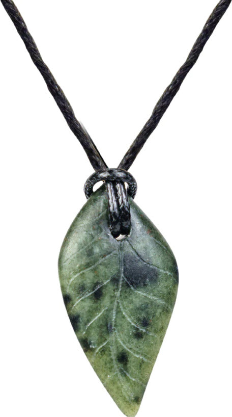 A handmade stone jewelry kit featuring a leaf-shaped jade pendant, delicately designed with intricate vein details. The pendant hangs from a sturdy black cord, making it a perfect DIY kit for creating unique accessories.
