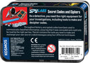 Spy Labs: Secret Codes and Ciphers kit by Thames & Kosmos. The packaging features colorful illustrations and descriptions about secret codes and cipher techniques. It highlights tools for making and deciphering codes, emphasizing the historical importance of encrypted communication.