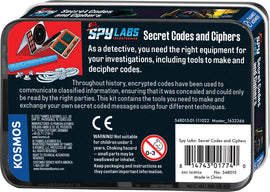 Spy Labs: Secret Codes and Ciphers kit by Thames & Kosmos. The packaging features colorful illustrations and descriptions about secret codes and cipher techniques. It highlights tools for making and deciphering codes, emphasizing the historical importance of encrypted communication.