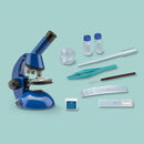 Kids First Biology Lab by Thames & Kosmos featuring a blue microscope, test tubes, a pipette, tweezers, and glass slides for hands-on science exploration.