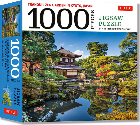 Tranquil Zen Garden in Kyoto jigsaw puzzle with 1000 pieces featuring a serene landscape. The image depicts a picturesque Japanese garden with lush greenery, a peaceful pond reflecting vibrant trees, and a traditional wooden structure against a clear blue sky. The puzzle size is 24 x 18 inches.