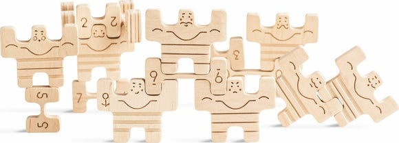 A wooden game set titled 'Circus Athletes' by Babai, featuring intricately carved pieces resembling acrobatic figures. The wooden figures include numbers and playful designs, ideal for engaging gameplay. Perfect for stimulating creativity and providing hours of fun.