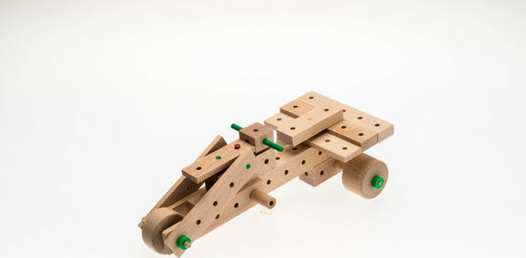 The Cars Explorer 50 pcs DIY kit by Matador features a wooden vehicle model with colorful pegs and holes, showcasing an engaging assembly experience for children and adults. Ideal for developing fine motor skills and creativity, this kit consists of high-quality wooden pieces designed to create an exciting car model.