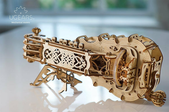 A beautifully crafted UGears 3D Hurdy-Gurdy DIY kit made from natural wood, showcasing intricate designs and mechanical components. This model highlights the elegant curves and detailed features, offering a creative building experience for enthusiasts.