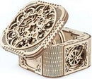 UGears 3D Treasure Box DIY kit, featuring intricate laser-cut wooden designs. The box is open, showcasing its beautifully crafted interior and ornate details, perfect for storing small treasures.