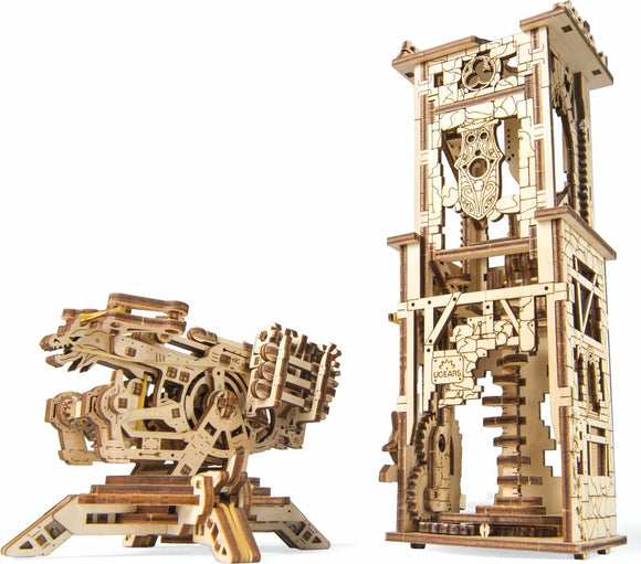 UGears 3D Archballista-Tower DIY kit featuring a detailed, mechanically intricate tower and an archballista. The wooden models exhibit precise craftsmanship with visible gears and mechanisms, perfect for enthusiasts of mechanical puzzles and creative assembly.