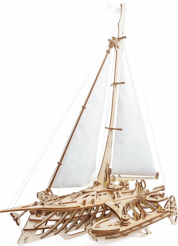 UGears 3D Trimaran Merihobus DIY model kit featuring intricately designed wooden parts that form a replica trimaran with sails. Ideal for model enthusiasts, this kit encourages hands-on creativity and skill development.