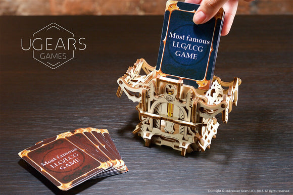A beautifully crafted UGears 3D Deck Box made of layered wood, designed for storing cards. The intricate details showcase its DIY assembly nature, while a hand is shown placing a card into the box, emphasizing its functional use in gaming.