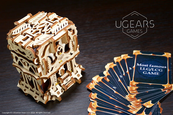 The UGears 3D Deck Box, a beautifully crafted mechanical puzzle kit made from wood. The intricate design features gears and cutouts, showcasing its unique aesthetic. Next to the box, there is a fanned-out set of game cards, adding to the appeal of this DIY kit perfect for enthusiasts who enjoy building and playing.
