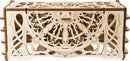 The UGears 3D Card Holder is an intricate DIY kit made from light-colored wood, featuring beautifully laser-cut patterns. It consists of a box with multiple compartments and a decorative design that combines elegance and functionality, ideal for organizing cards and small items.