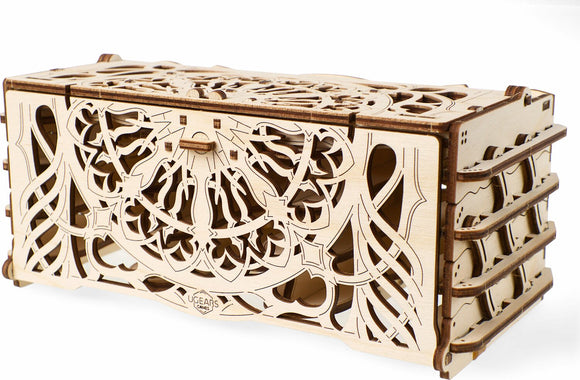 UGears 3D Card Holder DIY kit featuring an intricately designed wooden box with laser-cut patterns. The container has a unique, elegant lid and multiple compartments, perfect for organizing cards and small items. Ideal for crafting enthusiasts and those who appreciate functional art.