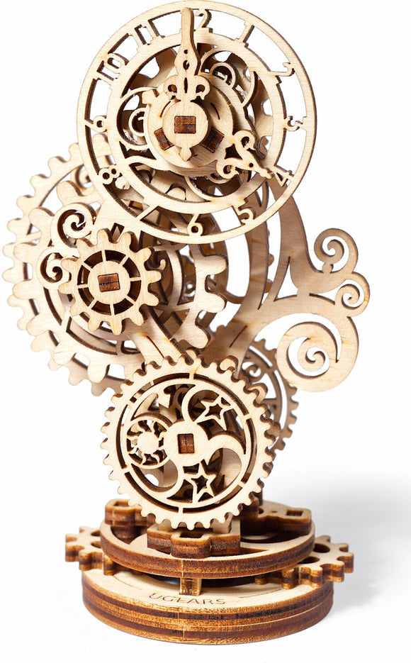 A detailed view of the UGears 3D Steampunk Clock DIY kit featuring intricately designed wooden gears and ornate clock elements. The structure showcases various circular clock faces and cogs stacked and intertwined, representing the steampunk aesthetic. The natural wood finish highlights the craftsmanship, making it a stunning decorative piece.