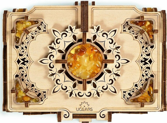 The UGears 3D Amber Box is a beautifully designed DIY kit made from natural wood, featuring intricate patterns and compartments filled with amber-colored pieces. This engaging model combines artistry and engineering, ideal for hobbyists and collectors. Perfect for displaying or storing small treasures.