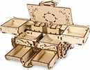 The UGears 3D Amber Box is an intricate DIY kit made of natural wood, featuring multiple compartments for storage. The design showcases delicate engravings and a unique, openable lid, perfect for organizing small items or as a decorative piece.